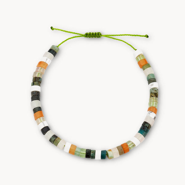 The seagrass cord bracelet from bluboho features an olive adjustable string adorned with gemstone beads in an alternating pattern of white, green, orange, and black.
