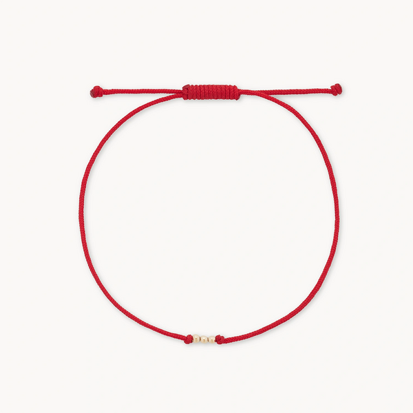 the abacus contemplation cord bracelet - 10k yellow gold, red cord