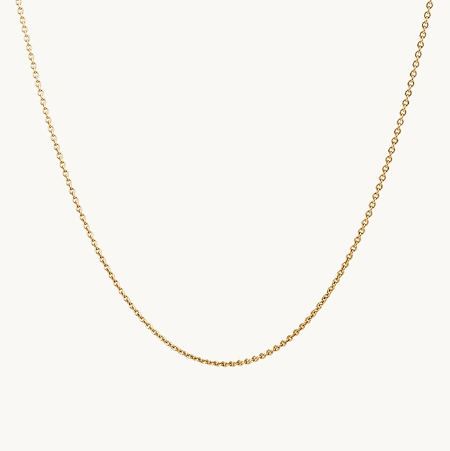 A delicate classic cable chain necklace in 10k yellow gold from bluboho, featuring small, evenly spaced round links, displayed on a plain white background.