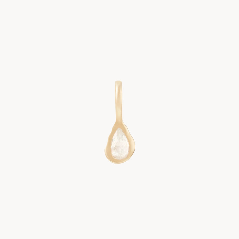 A close-up image showcases the "pear moonstone june mood birthstone charm" from bluboho. The 10k yellow gold pendant features a smooth, polished surface with a small loop at the top for easy attachment to a chain or string. Set against a plain white background, the charm's delicate simplicity stands out beautifully.