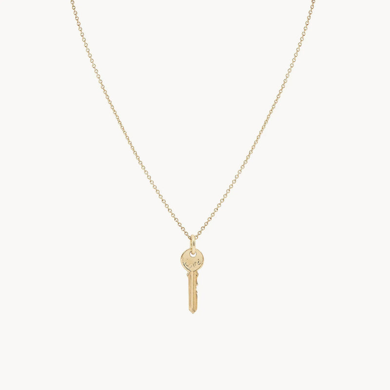 avata key charm - 10k yellow gold