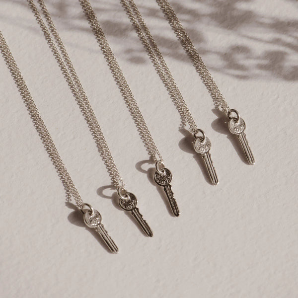 avata key charm - sterling silver