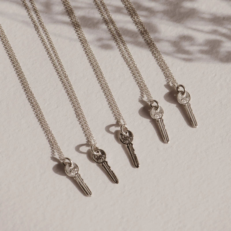 avata key charm - sterling silver