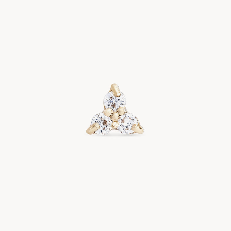 A close-up image of the Abacus Tripod Diamond Earring by Bluboho, showcasing three round, sparkling white diamonds set in a triangular formation. The 14k yellow gold prong setting holds the gemstones against a white background.