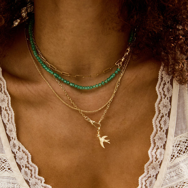 starbound swallow bird charm - 10k yellow gold, brillaint diamond