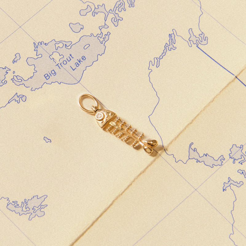 bare bones fish charm - 10k yellow gold, diamond
