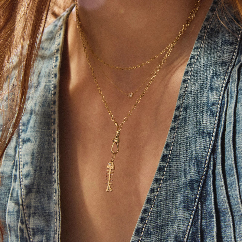 bare bones fish charm - 10k yellow gold, diamond