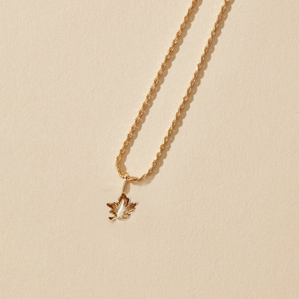 maple leaf charm - 10k yellow gold