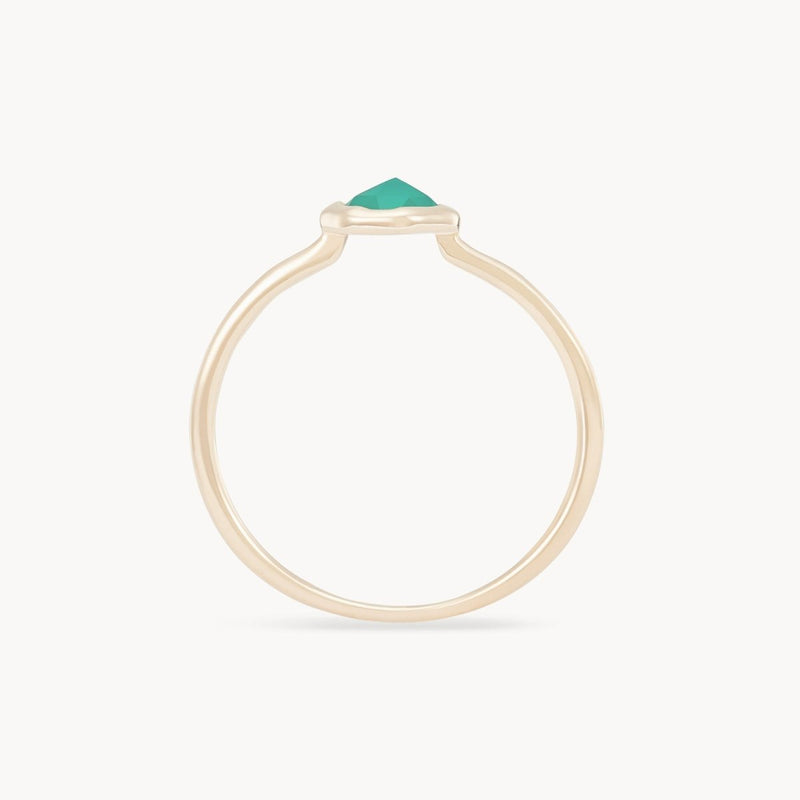 A green chalcedony mini mood ring in 10k yellow gold from bluboho, showcasing a minimalist design with a single green chalcedony gemstone at the center, viewed from the side against a white background.