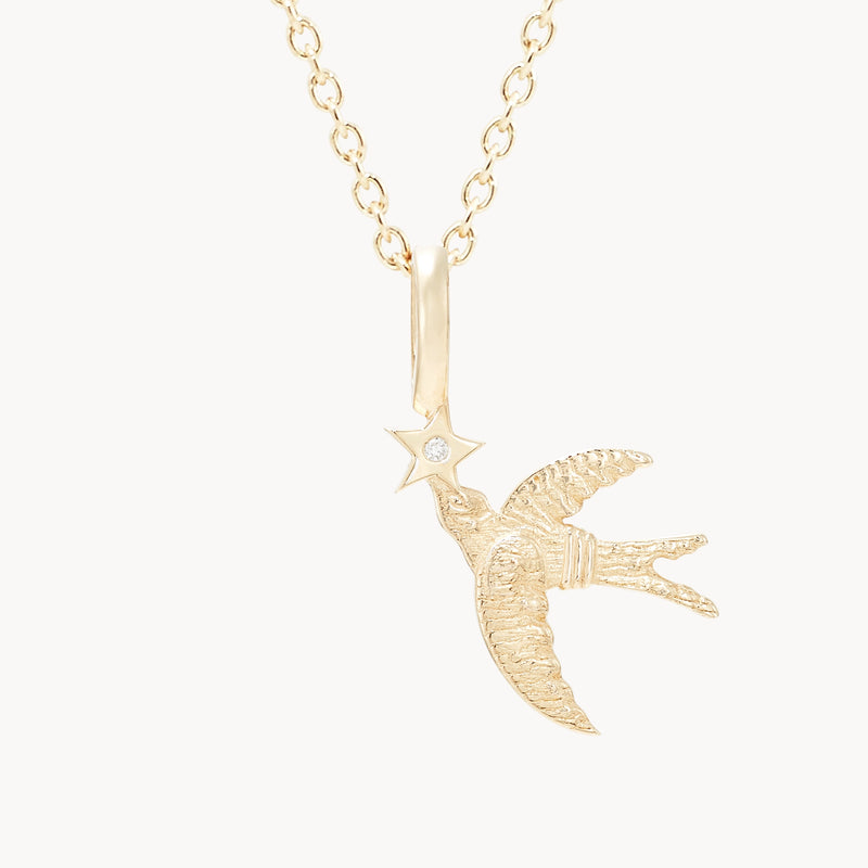 starbound swallow bird charm - 10k yellow gold, brillaint diamond