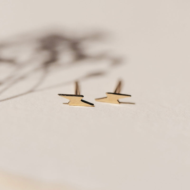 everyday little lightning bolt earring 14k yellow gold close up