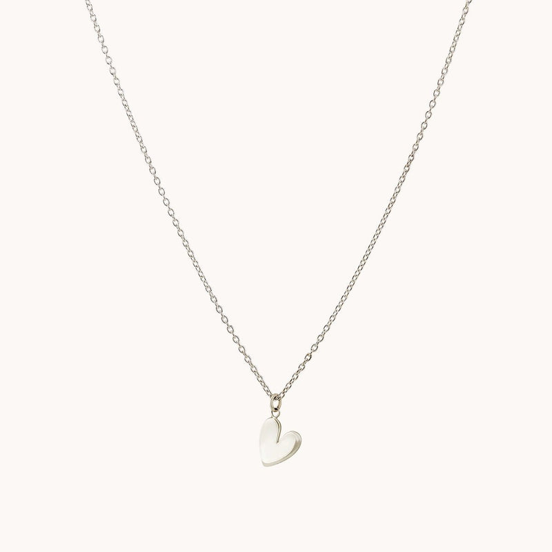 Introducing the "lovely necklace silver - sterling silver" by bluboho: a delicate chain necklace adorned with a small, polished heart-shaped pendant. The thin, minimalistic design of the chain highlights the simplicity and elegance of the heart charm against a plain white background.