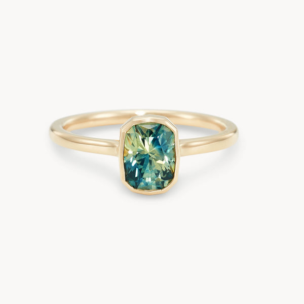 our cosmic meeting  one-of-a-kind ring - 14k yellow gold, Montana radiant cut sapphire