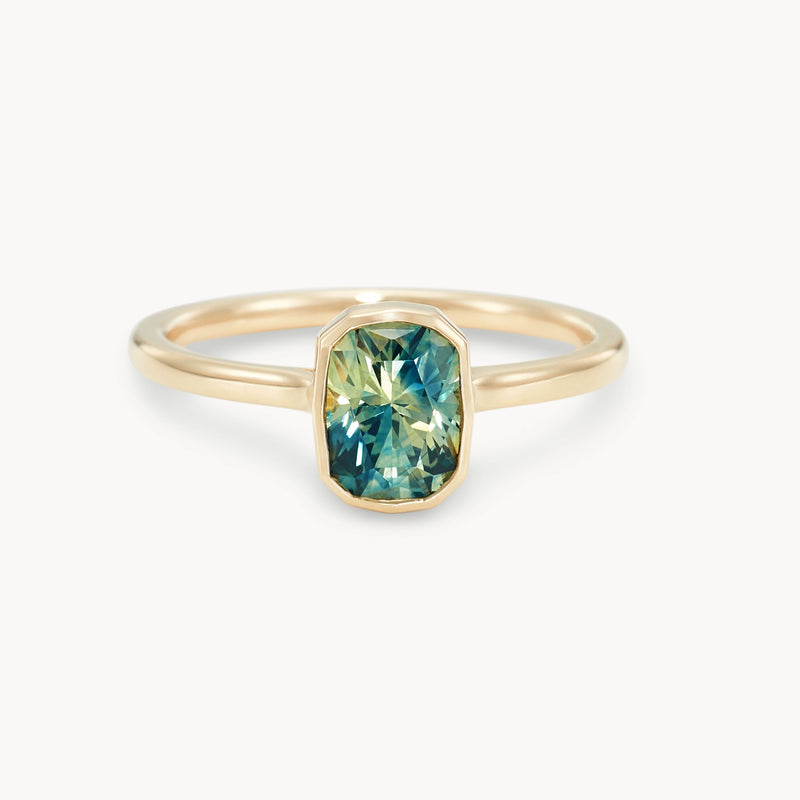 our cosmic meeting  one-of-a-kind ring - 14k yellow gold, Montana radiant cut sapphire