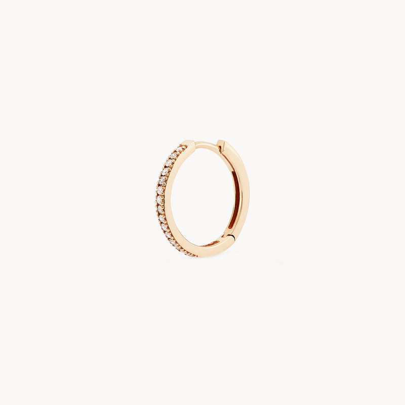 A single bluboho shine on hoop earring - 14k yellow gold, white diamond adorned with small diamonds along the outer edge. The earring is circular with a hinged clasp for closure, set against a white background.