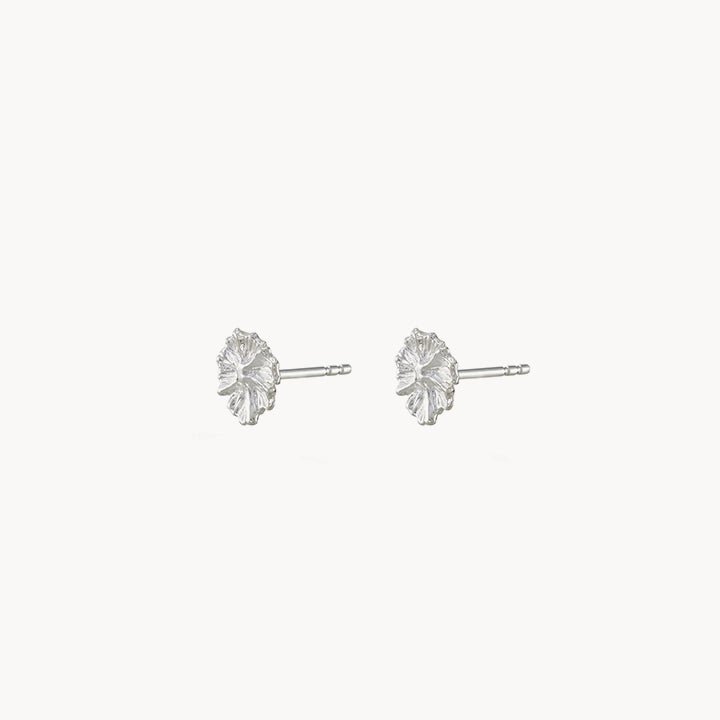 A pair of bluboho little wildflower earrings crafted from sterling silver, shaped like small flowers and set against a plain white background. Each earring features intricate petal details that lend a delicate and elegant appearance.