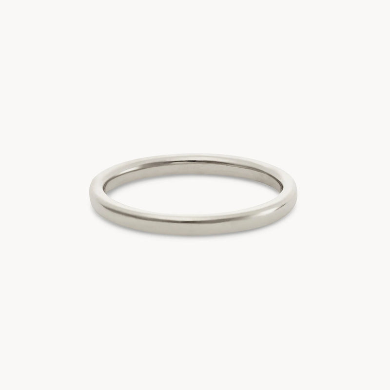 The Endalaus II ring, a thin, polished and shiny band made from 14k white gold by beloved by bluboho, is showcased against a plain white background. The ring has a smooth, round shape with no additional decorations or engravings.