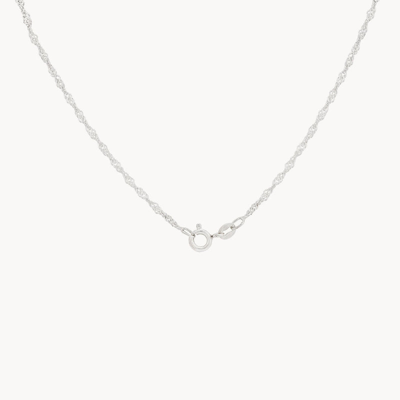 The bluboho Lightning Strikes Choker Necklace in sterling silver is showcased elegantly on a plain white background. The choker features interwoven links that create a twisted rope design and is secured with a small, simple spring ring clasp.